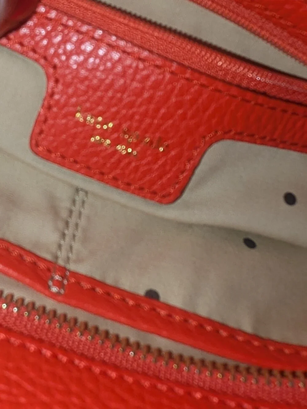 Kate Spade New York  Noel Rue Red Pebbled Perforated Leather Tote Bag.